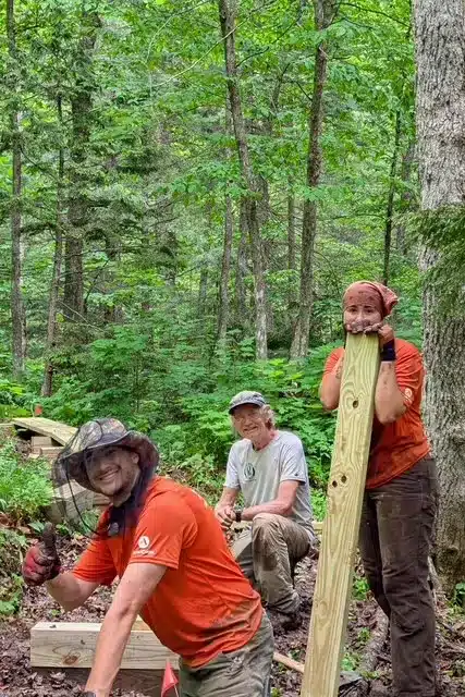 Volunteers Laying Planks for Trails